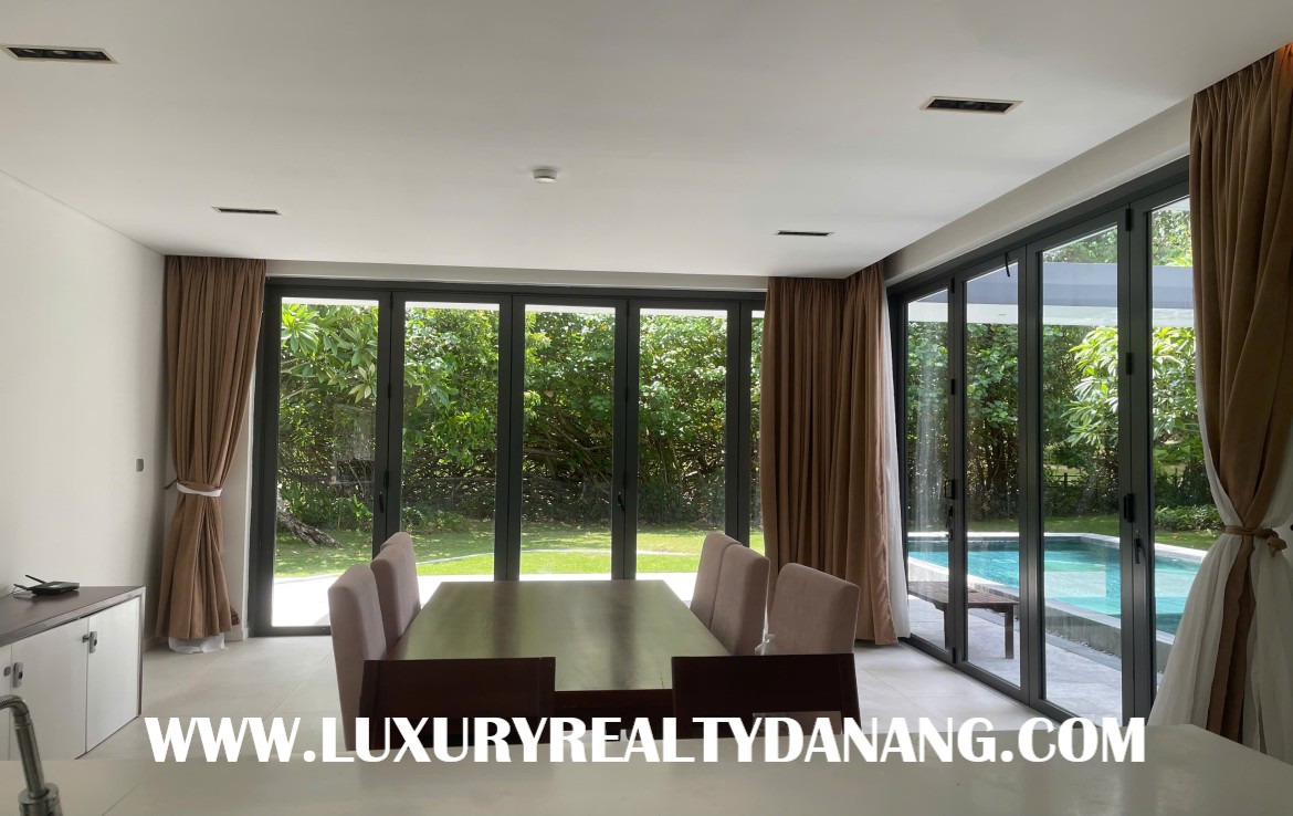 Golf course villa rental Danang in The Dune Residences, Vietnam, walking to the golf course